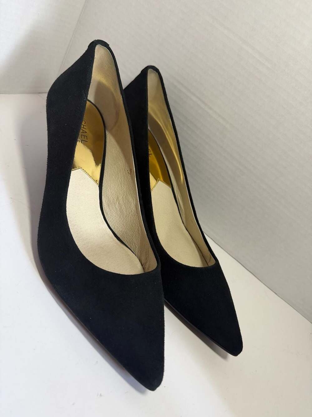 MICHAEL Michael Kors Black Suede Pointed Toe Kitten Heel Pumps with Gold Tone Lo